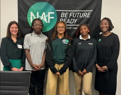 Elizabeth Ross, OSSE’s assistant superintendent of teaching and learning, with KIPP DC College Preparatory students Keith Harris, Donyae’ Vaughn and Casidee Tomlinson, as well as Monet Davis, NAF director at KIPP DC College Preparatory.